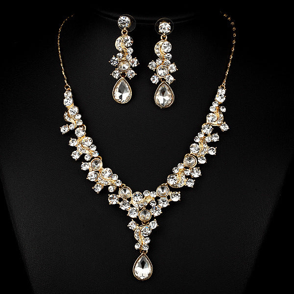 Wedding jewelry 2-piece set by CJ: gold-tone crystal necklace with teardrop pendant and matching drop earrings