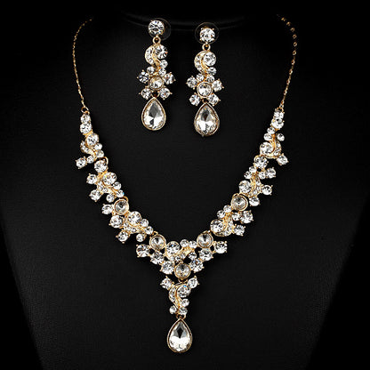 Wedding jewelry 2-piece set by CJ: gold-tone crystal necklace with teardrop pendant and matching drop earrings