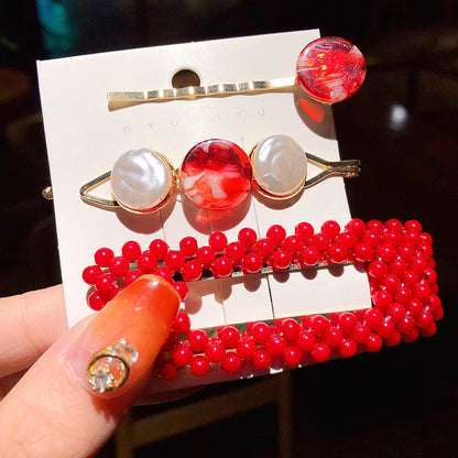 Girl's Simple Pearl Clip Set hair accessories; three-piece with red beaded clip and pearl accents