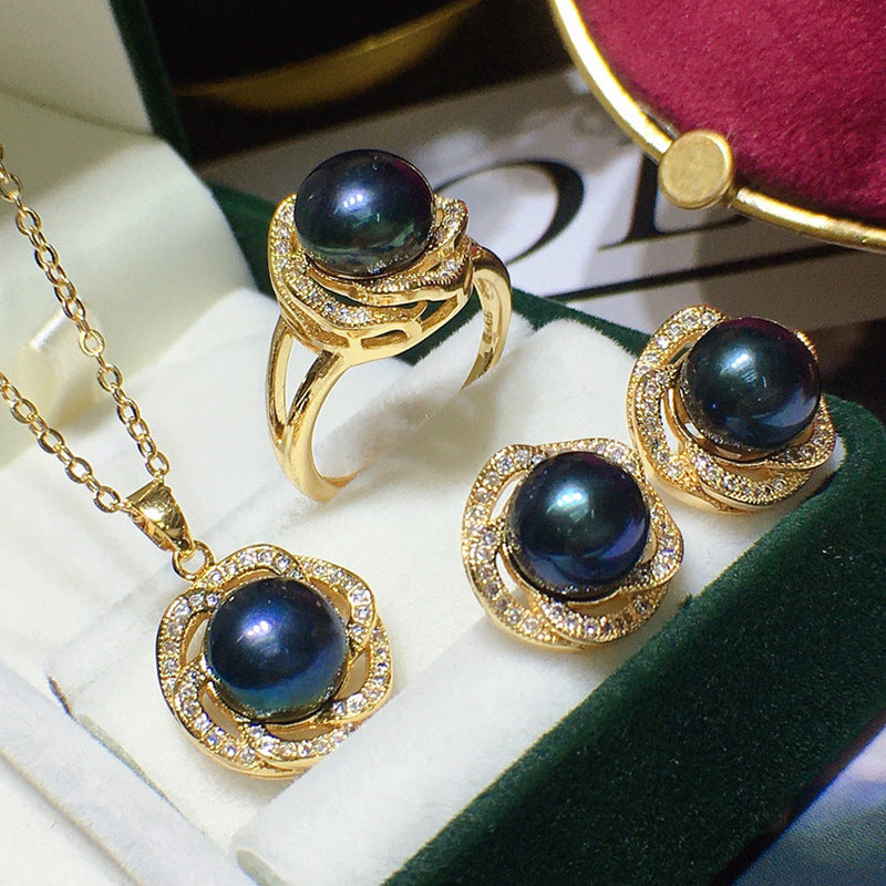 4-piece freshwater pearl jewelry set for women: gold-tone necklace, ring, and earrings with dark blue pearls