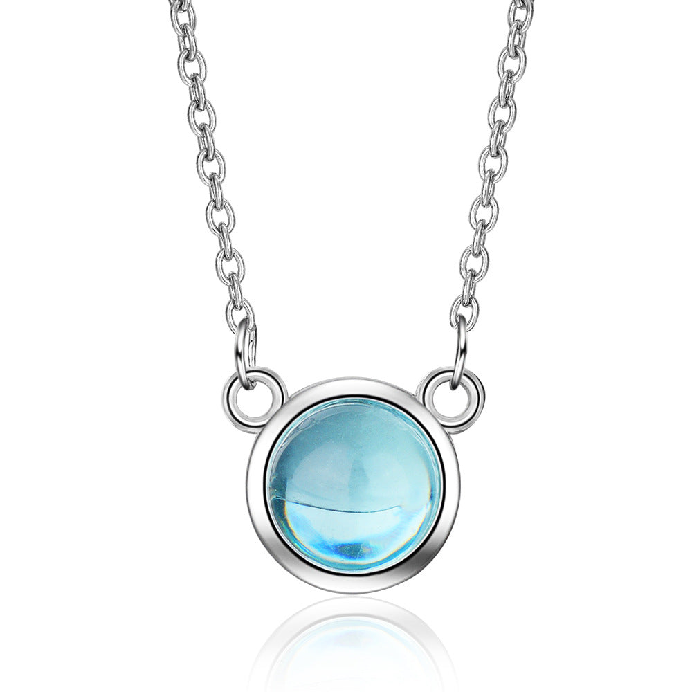 Blue gradient round pendant necklace on a silver-tone chain