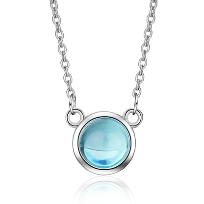 Blue gradient round pendant necklace on a silver-tone chain