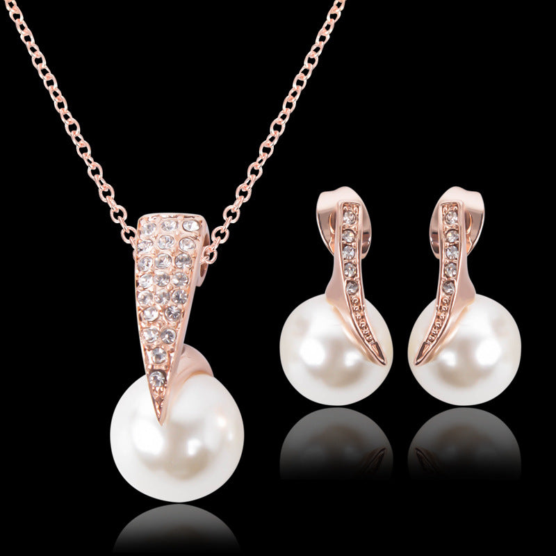 Creative Bridal Pearl Necklace Earrings Jewelry Set; rose gold-tone with crystal pavé and white pearls.