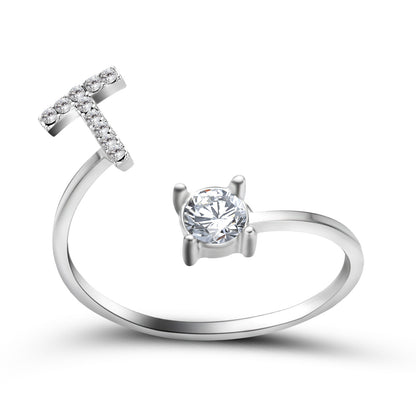 Ring by edenista, an adjustable silver band with pavé diamonds and a solitaire center stone