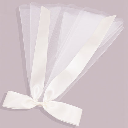 Ladies fashion ribbon bridal veil, short length in layered white tulle with a white satin ribbon bow