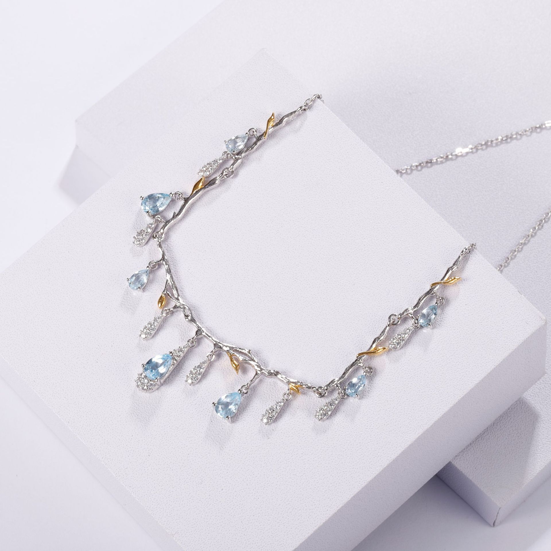 S925 silver natural topaz necklace with blue teardrop stones and crystal accents