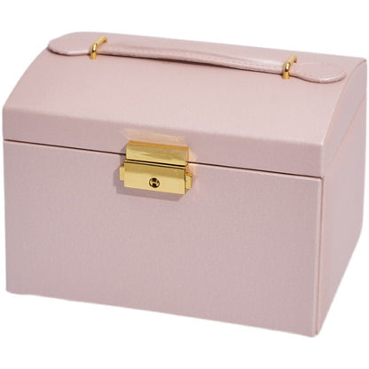 Three-layer drawer jewelry storage box, pink with gold-tone latch and top handle.