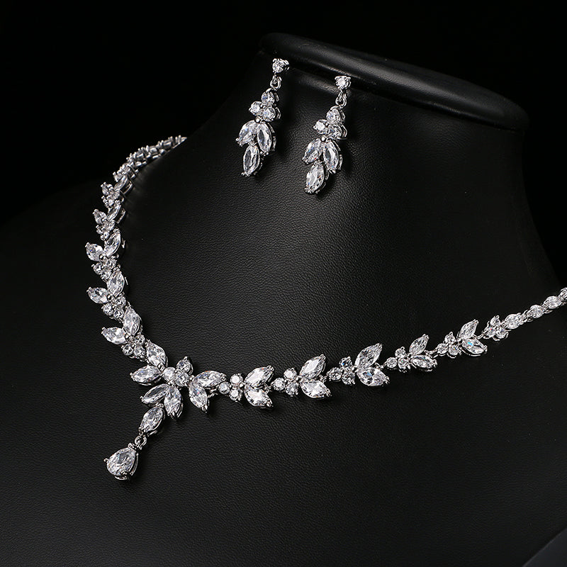 Zircon Simple Bridal Set by cj, silver-tone necklace and matching drop earrings with clear stones.