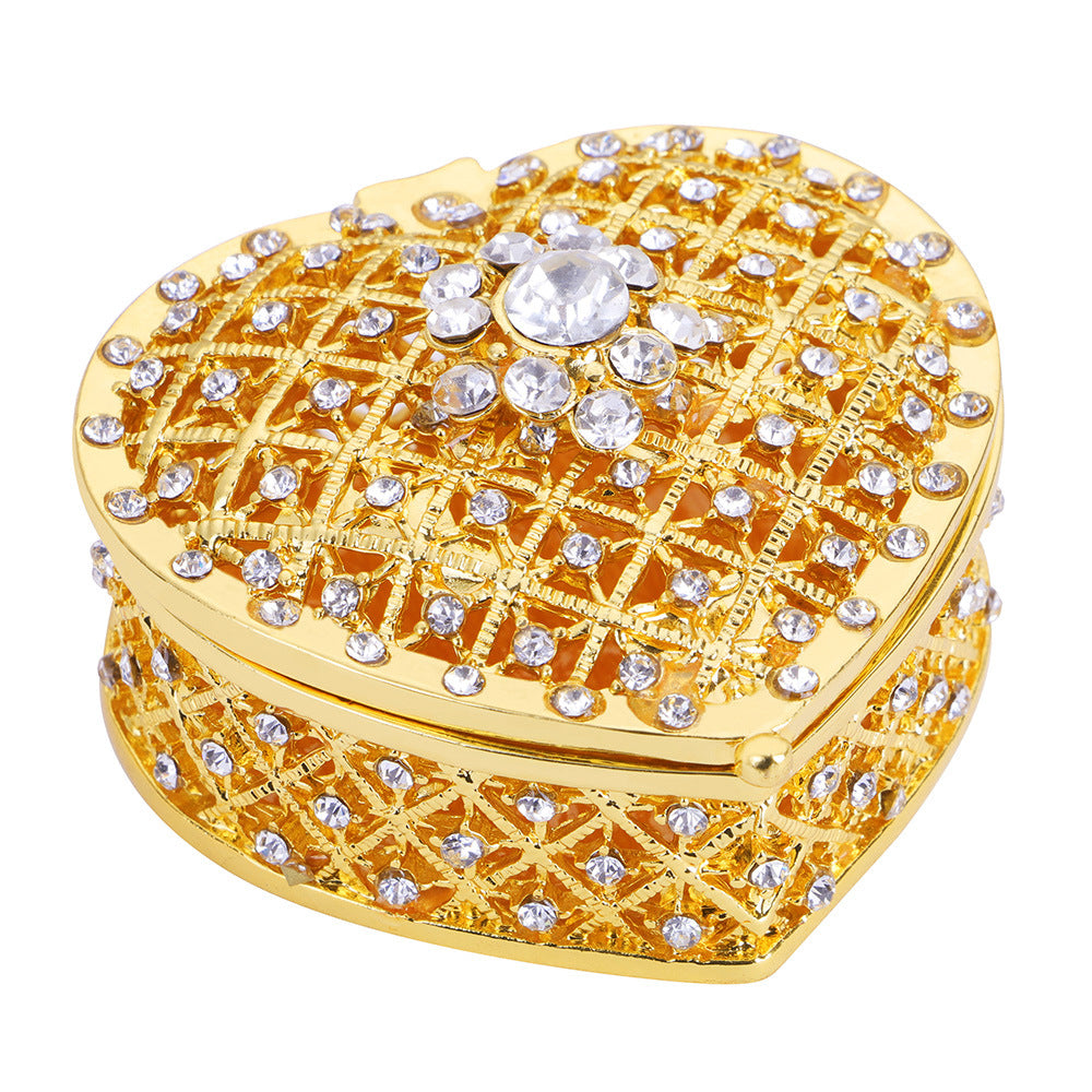 Heart-shaped gold-plated jewelry box with crystal rhinestones by edenista