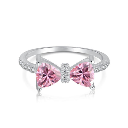S925 sterling silver bow ring with pink crystal bow centerpiece and pave diamond accents along the band