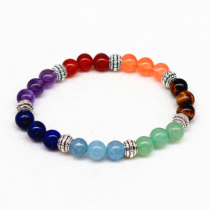 Reiki seven chakra bracelet with multicolor natural gemstone beads and silver spacers.