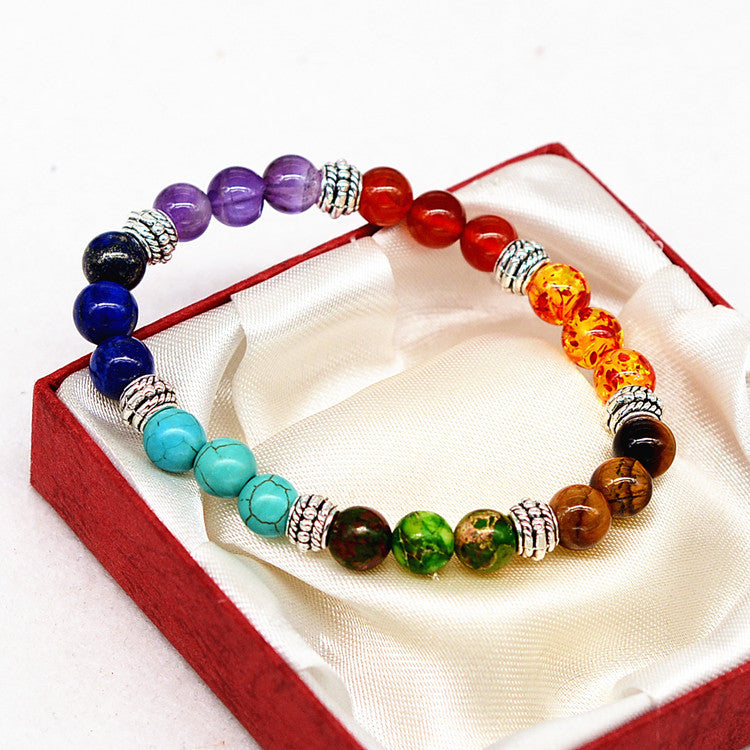 Seven chakra bracelet with colorful natural stone beads and silver spacers