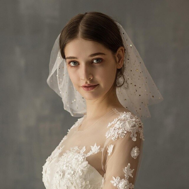 White Yarn Bridal Multi-layer Short Veil with gold specks, shown on a bride in a sheer lace gown.