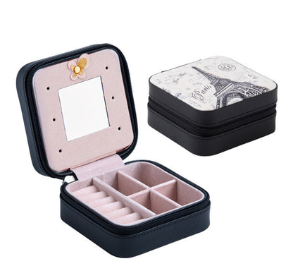 Portable travel jewelry box set by edenista, 2-piece, with black exterior, pink velvet interior and mirror.