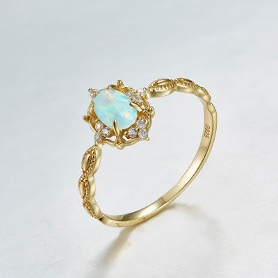 Gold-plated 925 silver ring with light blue opal and jeweled halo, vintage style