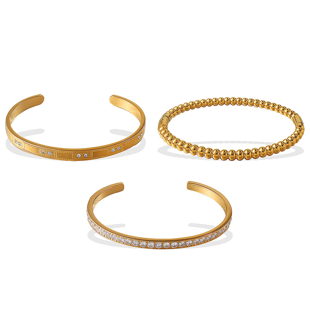 Gold-tone bracelet set: open-end crystal-accent cuff, beaded ball bracelet, and pavé diamond cuff (3 pcs)