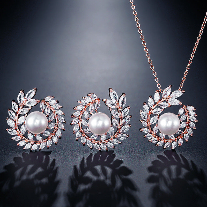 Ornament set chain jewelry; 3-piece rose-gold tone with pearl centers and crystal leaves (CJ)