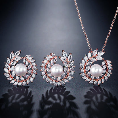 Ornament set chain jewelry; 3-piece rose-gold tone with pearl centers and crystal leaves (CJ)