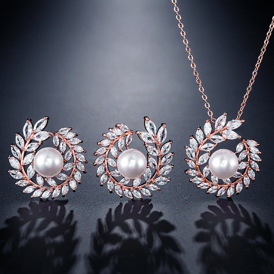 Ornament set chain jewelry; 3-piece rose-gold tone with pearl centers and crystal leaves (CJ)
