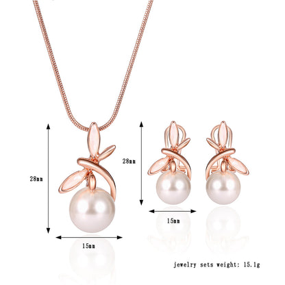 Pearl necklace and earrings 3-piece set in rose-gold with leaf accents by cj