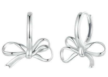 Bow-shaped ear clips in S925 sterling silver by CJ, set of two.
