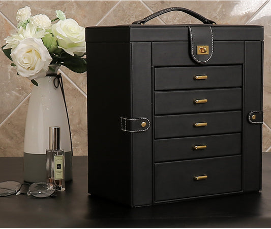 edenista black multifunctional jewelry box with gold-tone hardware and top handle.