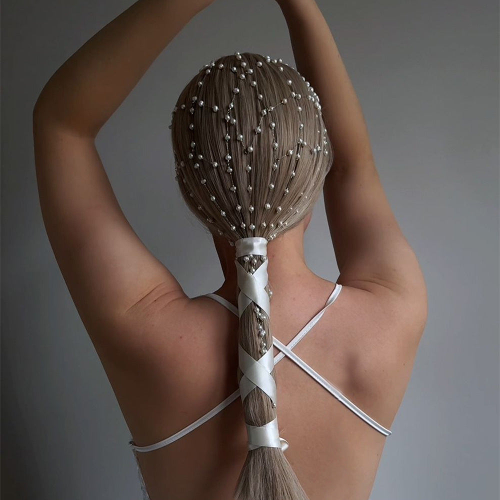High-end Pearl Hairband with pearl strands and satin ribbon wrap, shown on model's back
