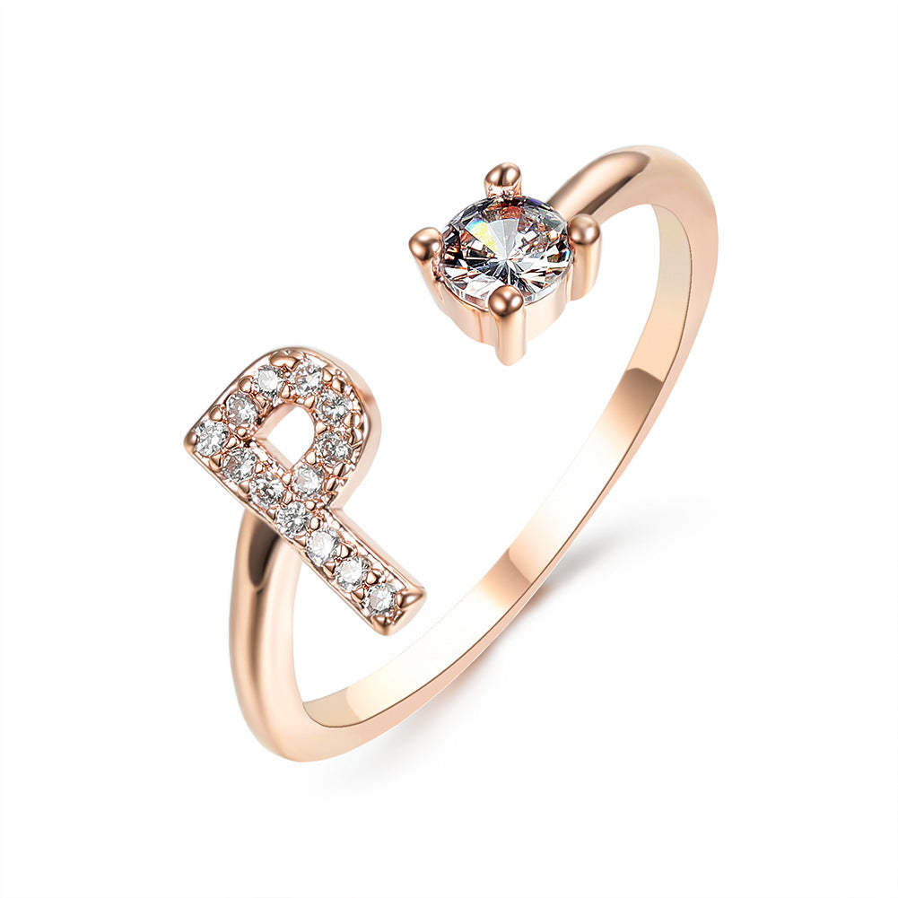 Ring in rose gold adjustable initial L with pave crystals and solitaire diamond