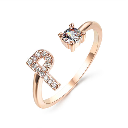 Ring in rose gold adjustable initial L with pave crystals and solitaire diamond