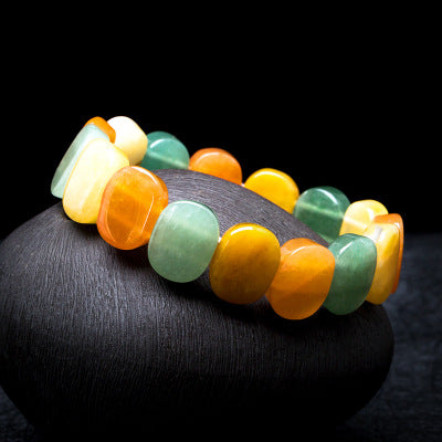 Natural crystal bracelet with multicolor yellow, orange, and green beads