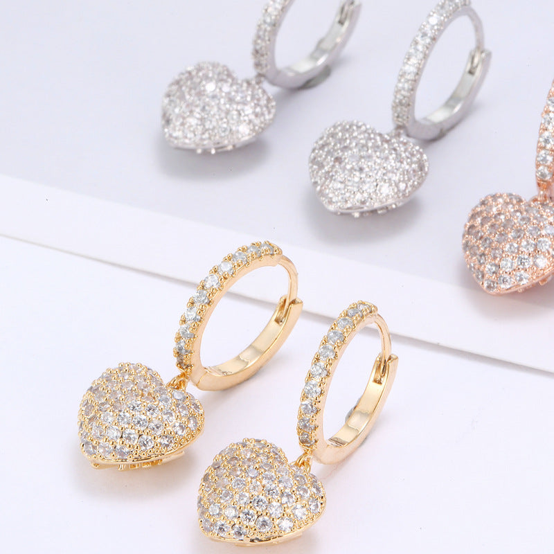 Heart pendant hoop earrings set in gold-tone, silver-tone and rose gold with pavé diamonds