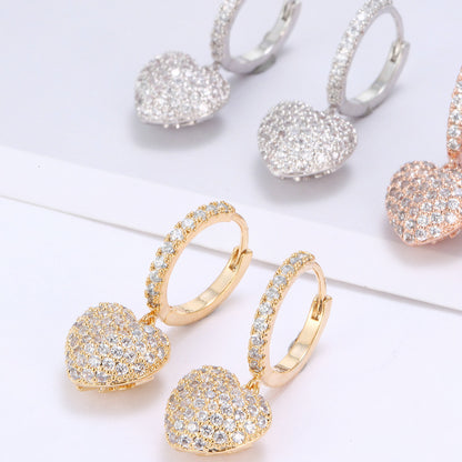 Heart pendant hoop earrings set in gold-tone, silver-tone and rose gold with pavé diamonds