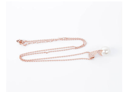 Bridal pearl necklace with large pendant on rose gold chain