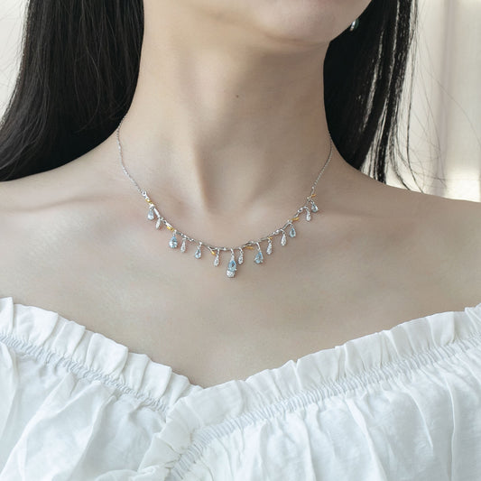 S925 silver natural topaz necklace with teardrop blue topaz drops on a delicate chain.