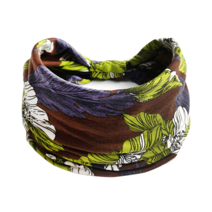 Bohemian Cashew Yoga Headband with brown, lime green and purple floral print; elastic