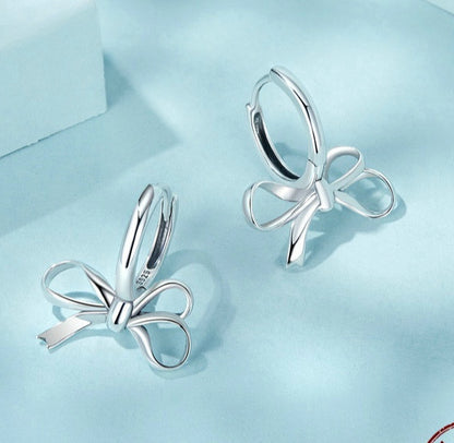 Bow ear clips, S925 sterling silver by CJ, simple all-match pair.