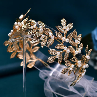 Bridal headband alloy hair accessory in gold with leafy motif and pearl beads