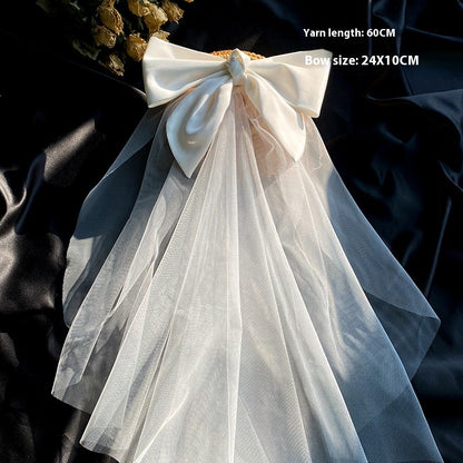Bow Veil by cj; white satin bow with sheer tulle veil, 60cm long