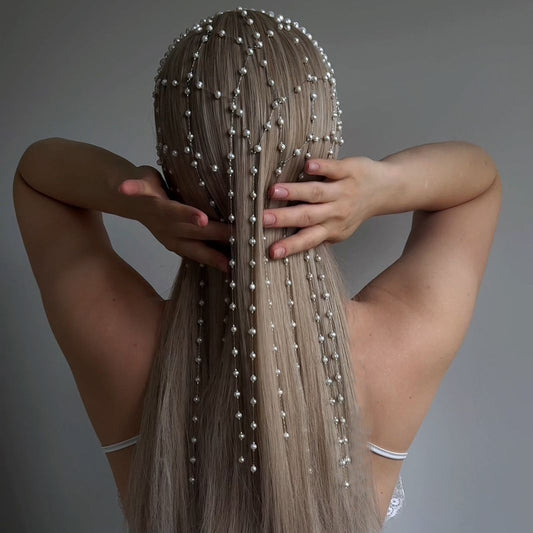 Pearl hairband accessory by CJ with cascading white pearl strands for formal dresses.