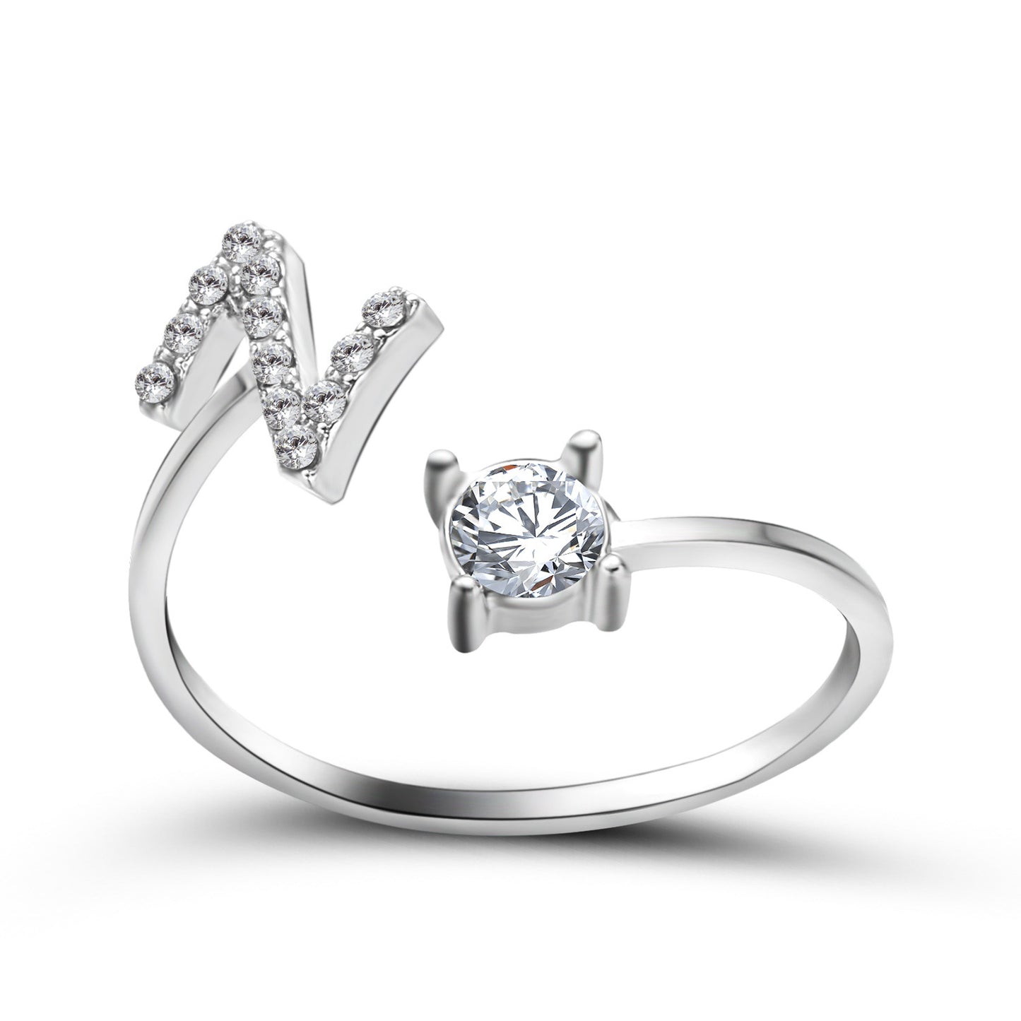 Initial letter ring set by Edenista: adjustable V-shaped pavé ring and a solitaire diamond ring