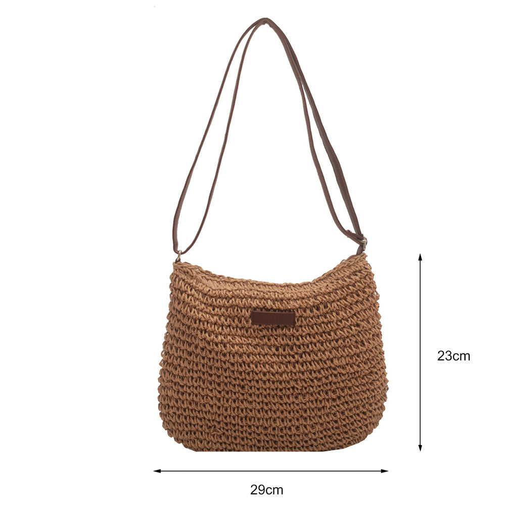 Niche Design vacation straw tote bag with tan straw body and brown leather handles by cj