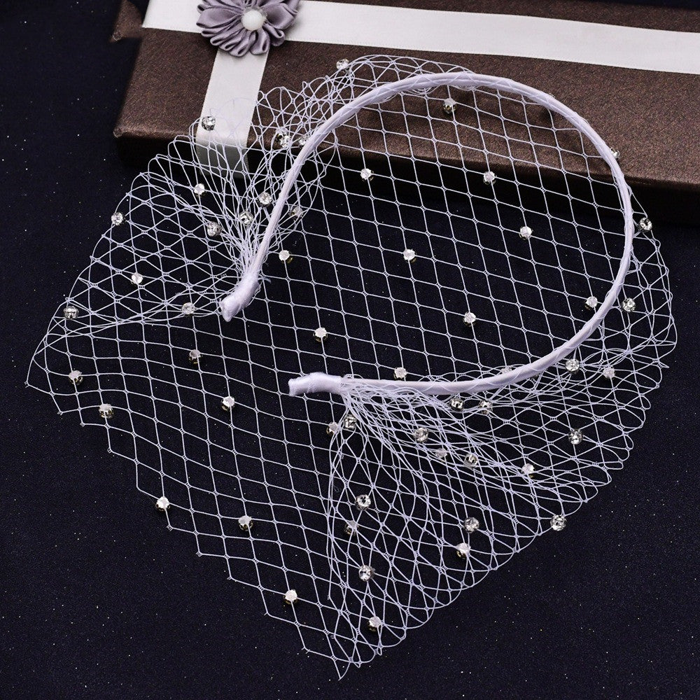 Rhinestone Veil And Mesh Headband white bridal headwear with crystal beads.