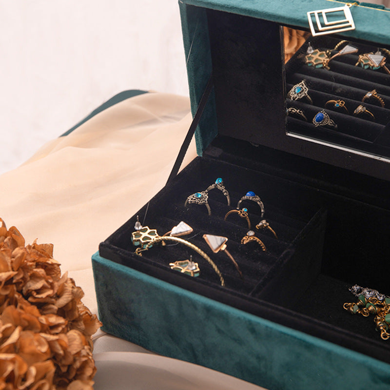 edenista teal velvet jewelry box with compartments and mirror, displaying rings and earrings
