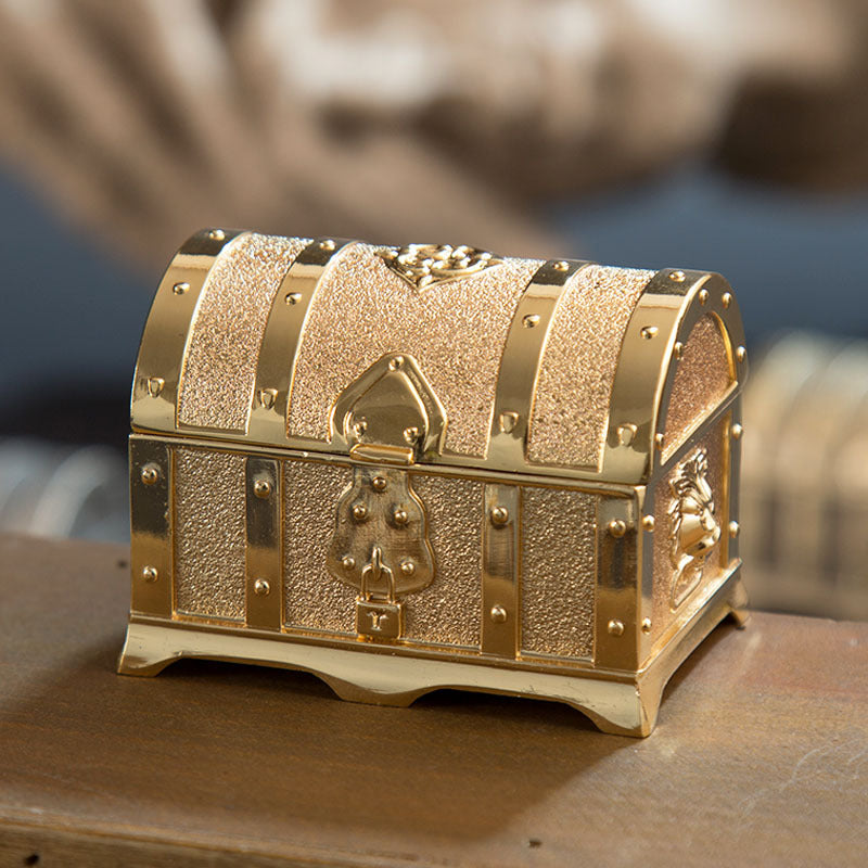 All Metal Princess Jewelry Box by edenista; gold-toned treasure chest jewelry storage with riveted bands.