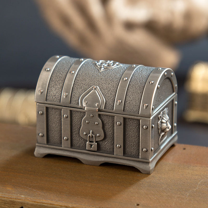 All-metal princess jewelry box treasure chest by edenista, silver with riveted panels and padlock.