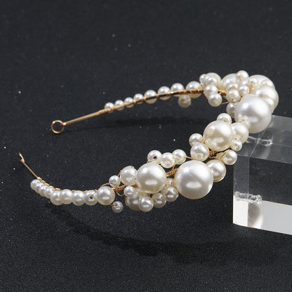 Retro bridal pearl headband with gold-tone wire and ivory pearls