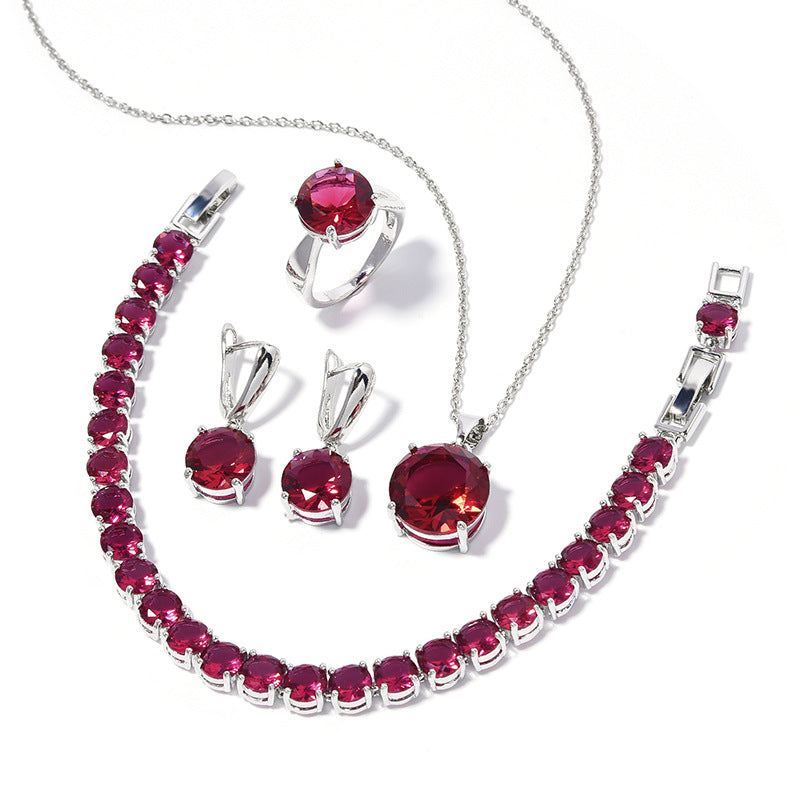 cj Four-piece geometric red gemstone jewelry set: necklace, bracelet, ring, and earrings in silver