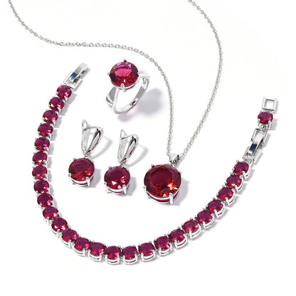 cj Four-piece geometric red gemstone jewelry set: necklace, bracelet, ring, and earrings in silver