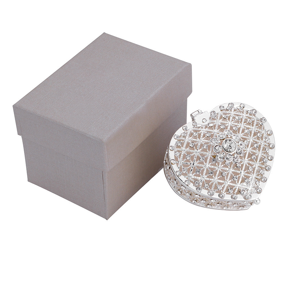 edenista heart-shaped metal jewelry box with crystal lattice, silver-tone finish; shown with gray gift box.