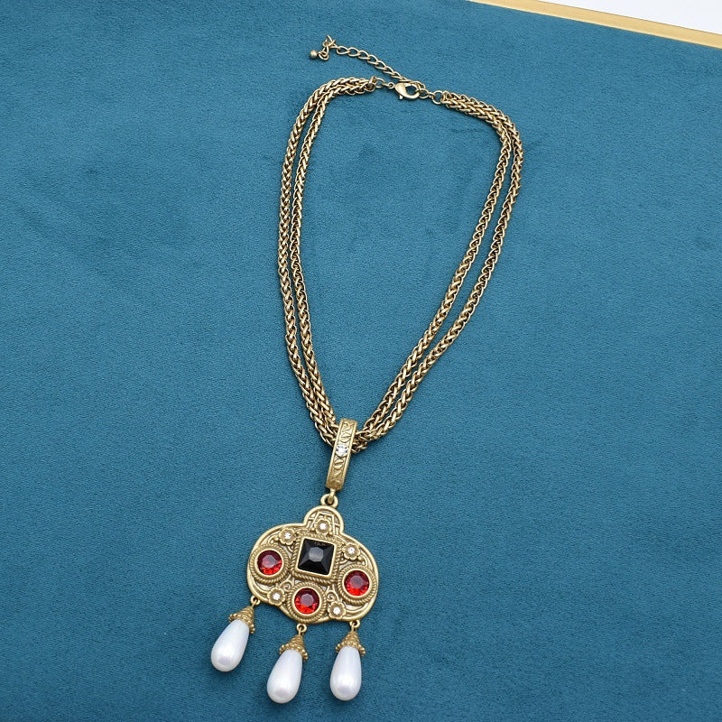 Vintage glass inlaid tassel pearl necklace with gold-tone chain and drop pearls